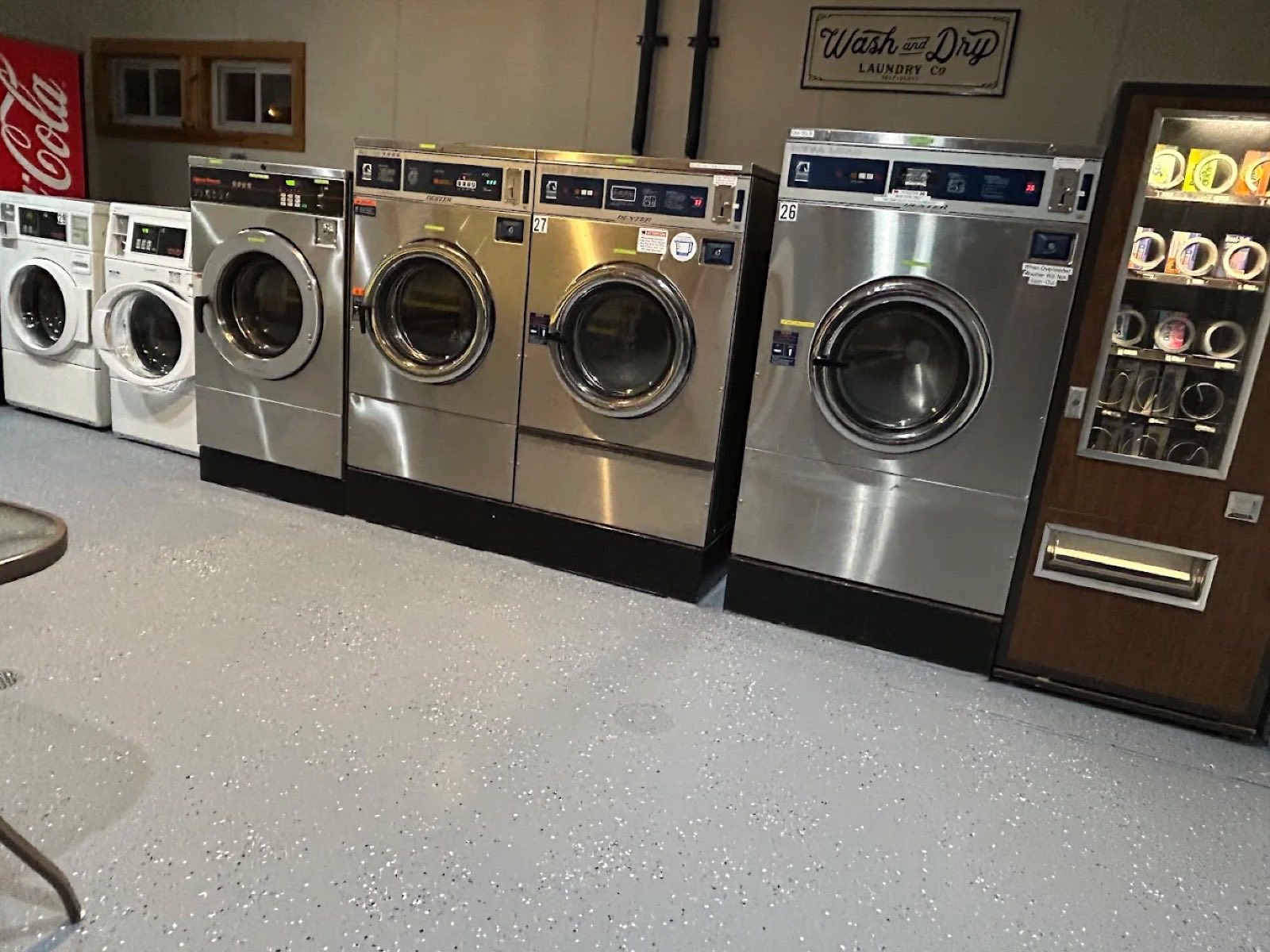 Washers at Bayside Coin Laundry, from standard Speed Queen front-loaders to large-capacity Dexter Maxi Load machines